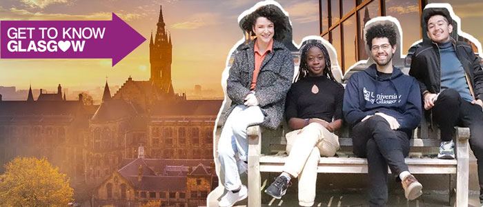 Students sitting on a bench in front of the University Tower