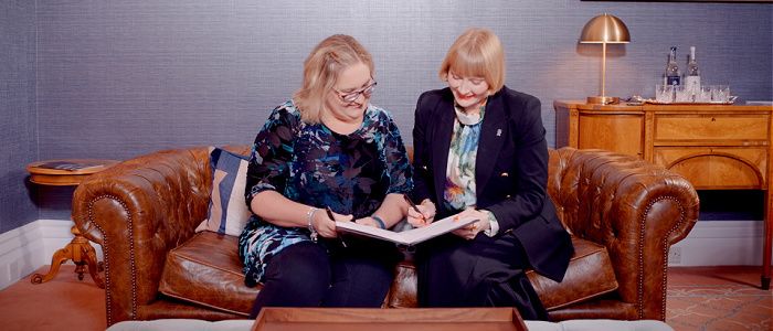 Professor Kathy Belov, Sydney Deputy-Vice-Chancellor (Global Research & Engagement), and Rachel Sandison, Glasgow Deputy Vice Chancellor (External Engagement) signing the new agreement in Glasgow.