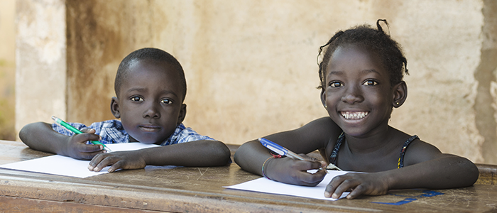 African school children with books