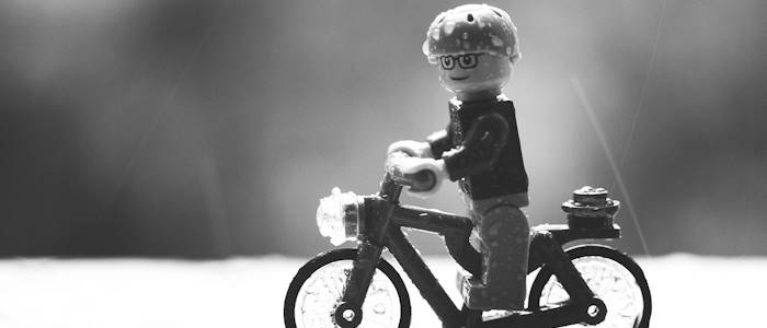 Lego figurine on bike