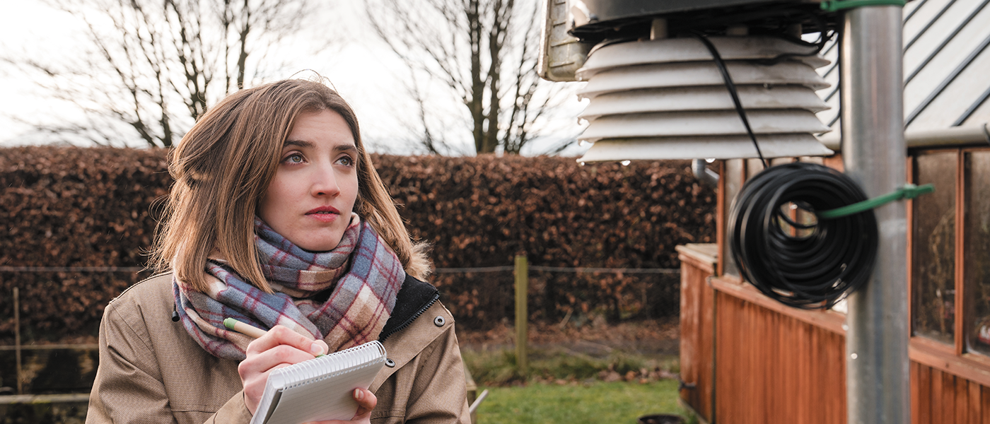 Student at weather monitoring station