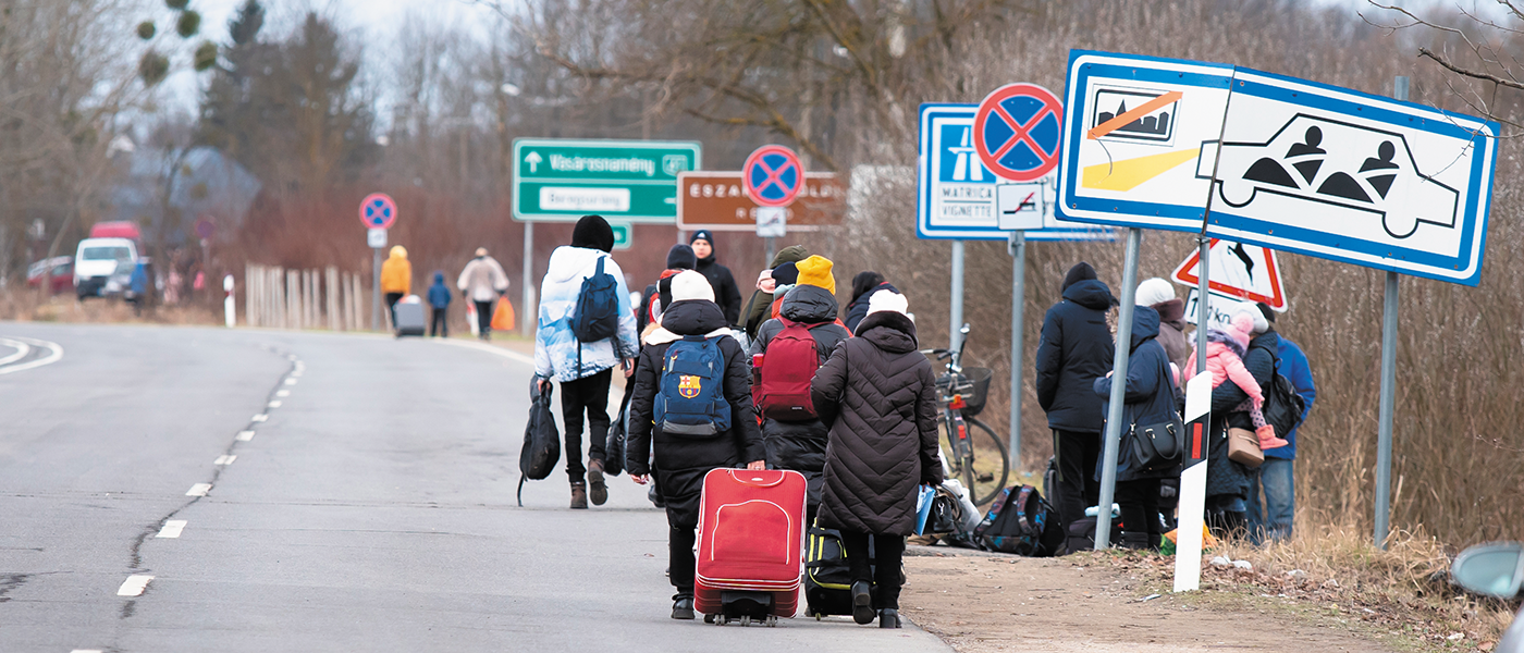 Ukrainian families flee the war across the Hungarian border to a peaceful area