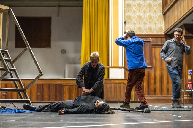 Panic on set after a trailing cable leads to an accident occurring in the final scene of the Set Ready Safety immersive training programme. Actors: Isobel Moorhouse, Victoria Giambalvo, Jack Hunter and Dave Gerow Credit. Tim Anger Panic on set after a trailing cable leads to an accident occurring in the final scene of the Set Ready Safety immersive training programme. Actors: Isobel Moorhouse, Victoria Giambalvo, Jack Hunter and Dave Gerow Credit. Tim Anger