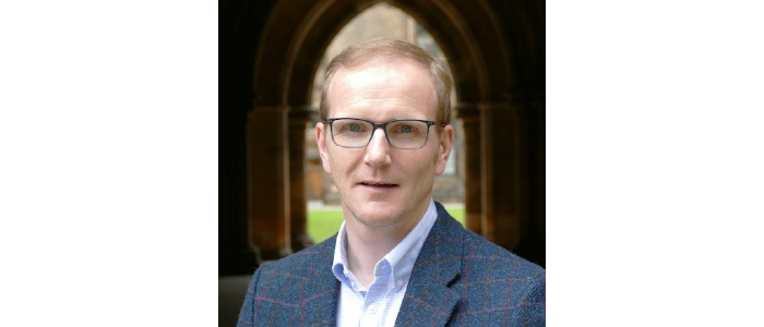 Graeme Roy, smiling at camera
