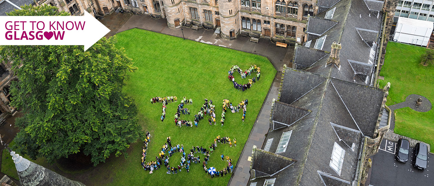 TeamUofG written out by people standing in the quad