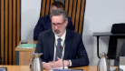 Dr Ian C. Elliott giving evidence in Parliament