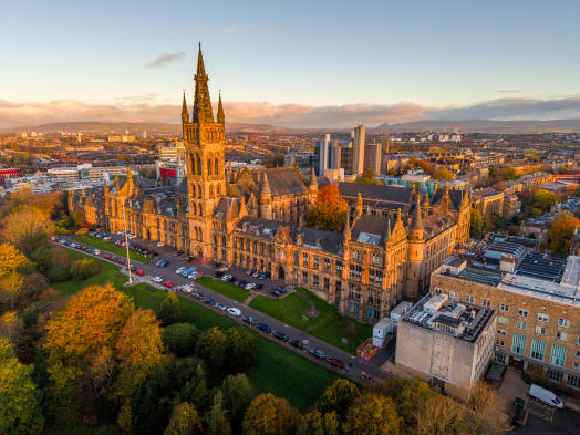 Drone shot of the Gilbert Scott building at sunset
