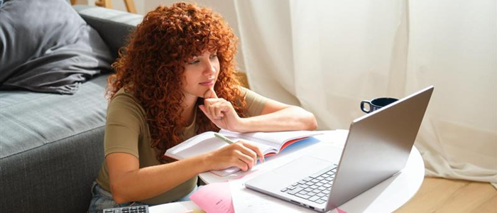 student at home with laptop