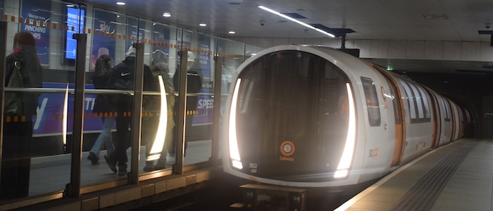 Glasgow Subway Train Pulling Into Station