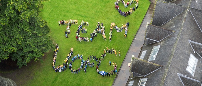 students on the quads making team uofg and a love heart