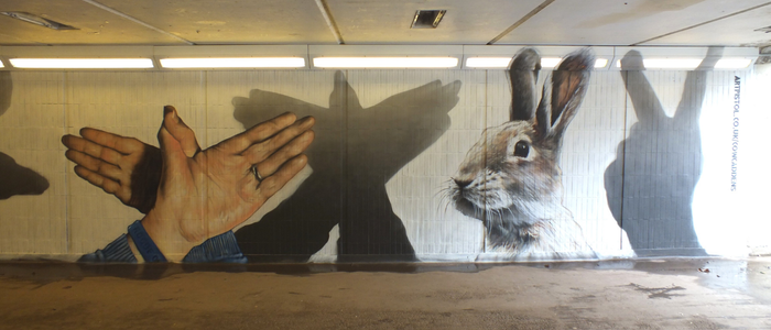 A mural depicting hand puppets