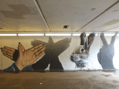 A mural depicting hand puppets