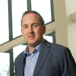 Portrait photo of Dr Gordon Dobie