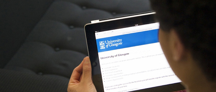 Student looking at a tablet