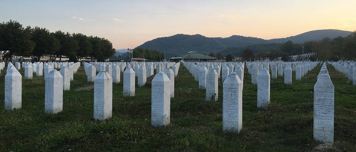 Image of gravestones marking those killed in the Srebrenica genocide