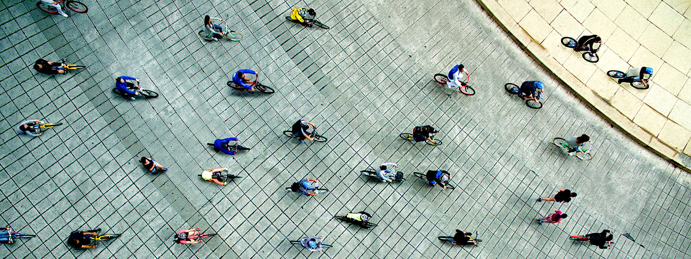 Image from above of students riding bikes