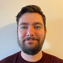 A portrait photo of Dion Blackburn