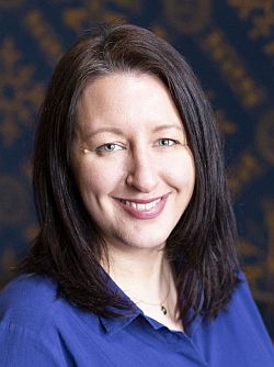 A portrait photo of Caryn Hughes