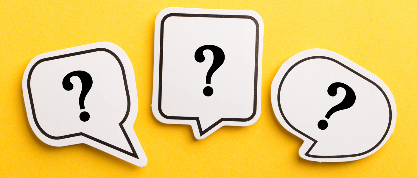 Three questions marks in speech bubbles on a yellow background