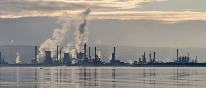 massive chemical plant by the sea