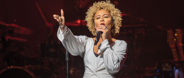 Emile Sande on stage singing