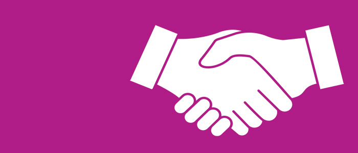 Graphic of two hands shaking on a pink background