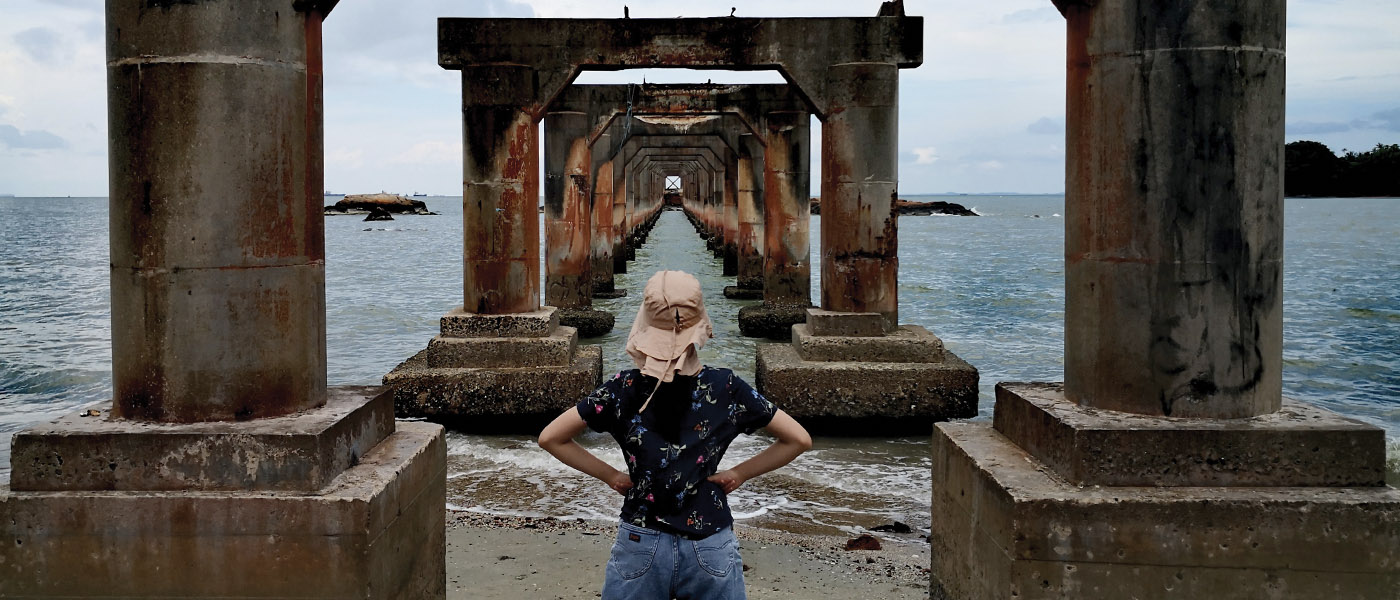 Angie Sin (MRes 2008, PhD 2018) reflects at Perhentian Island in Malaysia.