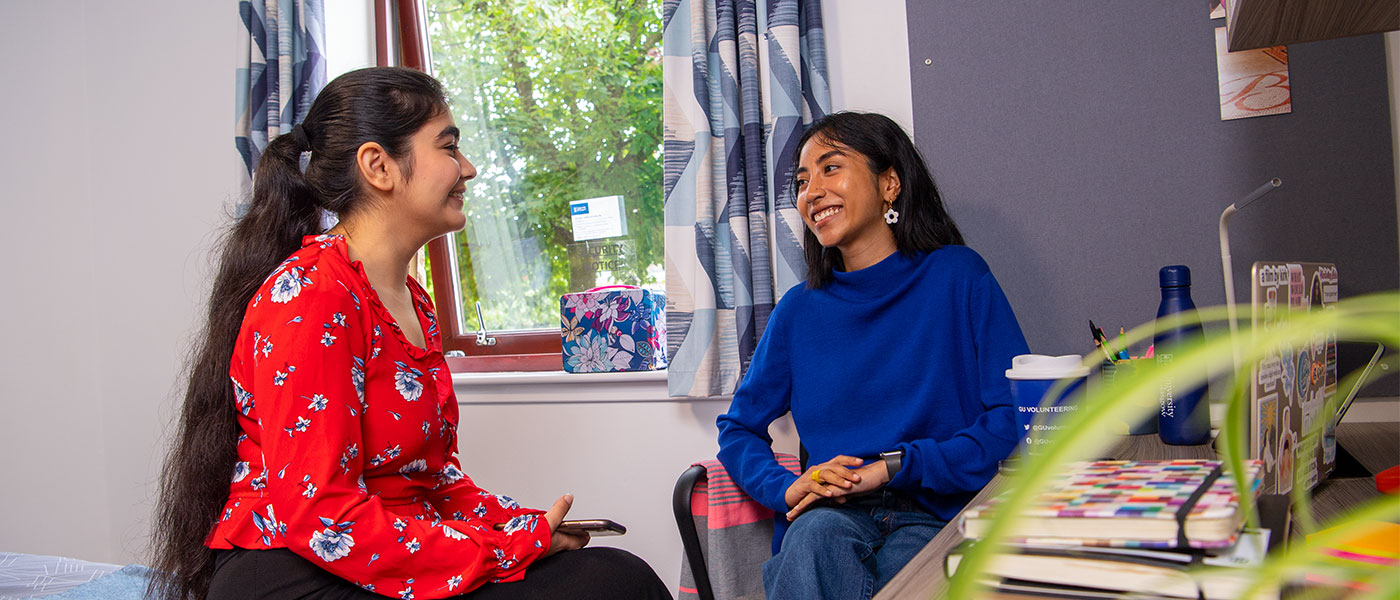 Students chatting in University accommodation