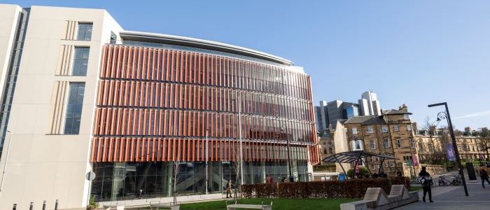 Outside image of red James McCune Smith Building