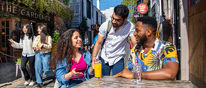 Students sitting in a bar on Ashton Lane